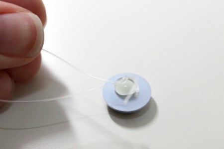 put fishing line into glue