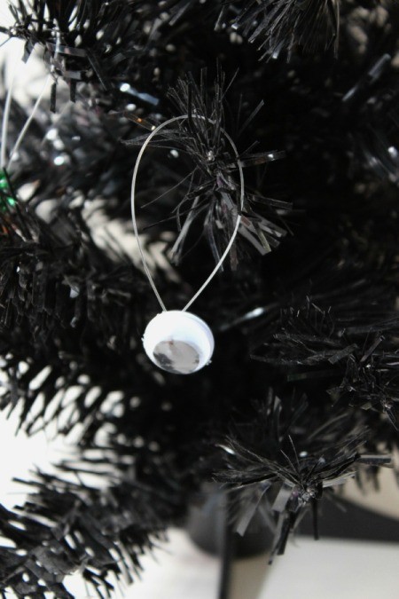 googley eye ornament in tree