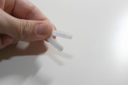 fold piece of chenille stick in half