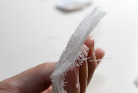put fishing line through cheese cloth