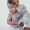 young baby with puppy
