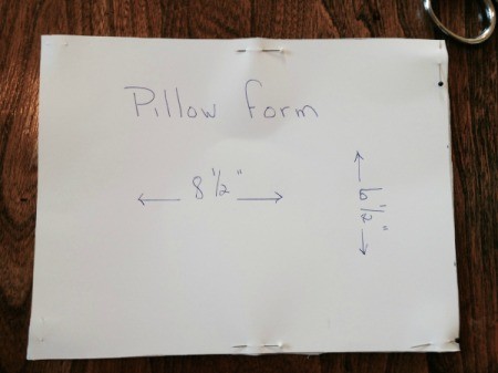 pillow form fabric cut out and still pinned to template