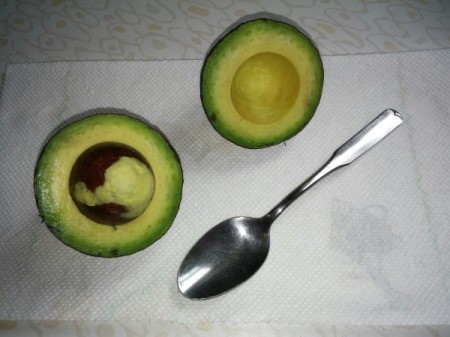 split avocado with seed still in place