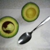 split avocado with seed still in place