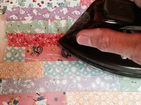 ironing the front of strip piece