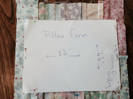 case front pattern pinned to fabric strip piece