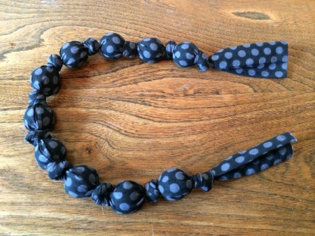 beaded and knotted fabric