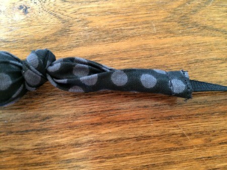 ribbon sewn onto necklace