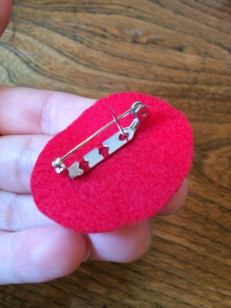 sew pin back onto felt