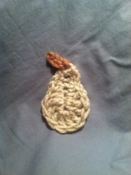finished pear on fabric background