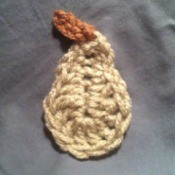 finished pear on fabric background