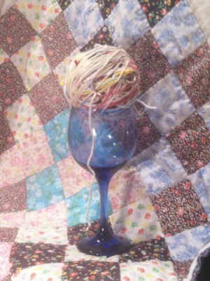 Scrap Yarn Ball - ball of yarn in stem glass