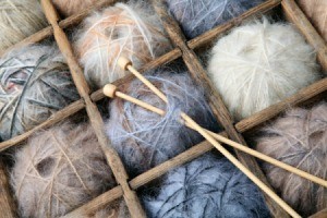 balls of wool and knitting needles