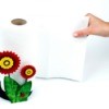 paper towel being pulled off cute flower holder