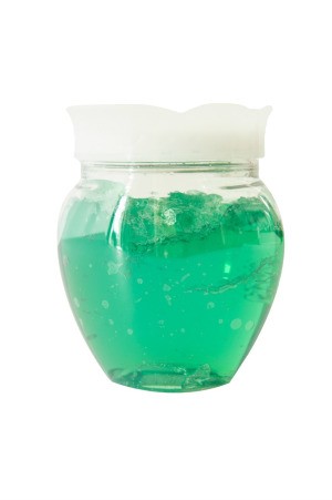 glass jar with green transparent deodorizer