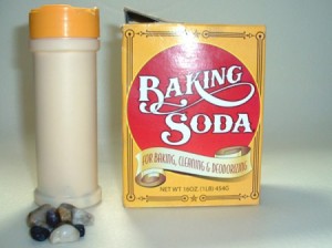 box of baking soda and a spice bottle