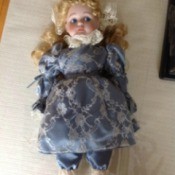 doll in blue dress