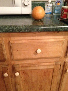 view of cabinet fronts and countertop