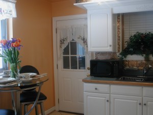 view of kitchen with walls, cabinets, and existing countertops