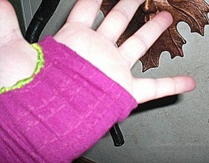 hand with sock arm warmer