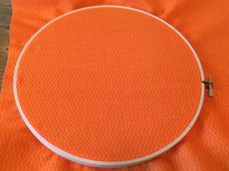 put fabric in hoop