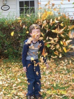 Mike Playing in the Leaves