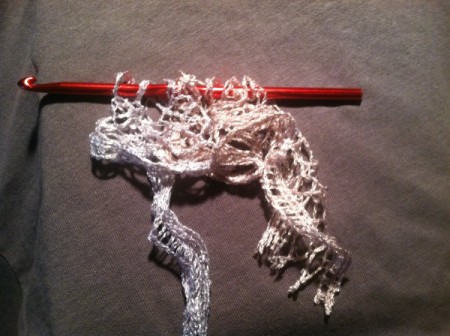 hook through lace of yarn