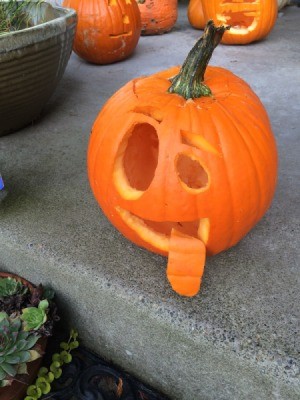goofy pumpkin with a tongue hanging out