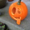 goofy pumpkin with a tongue hanging out