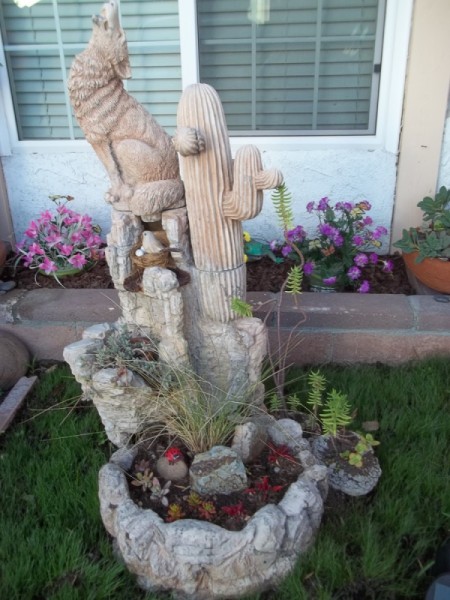 howling coyote and saguaro cactus fountain