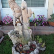 howling coyote and saguaro cactus fountain