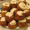 Individual Pumpkin Bundt Cakes - a stack of finished cakes on a plate.