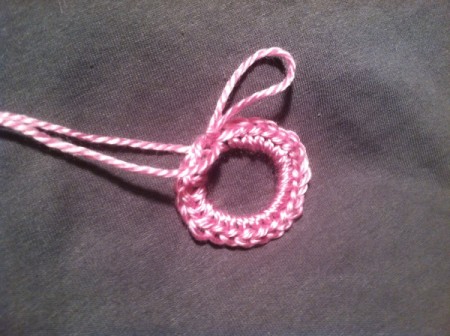 Crochet Newborn Mitts - work 23 more sc around rubber band