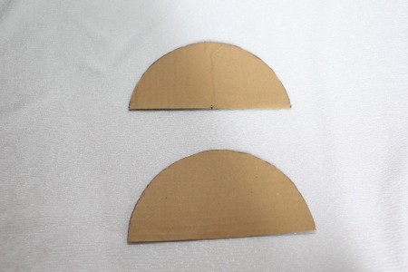 two matching cardboard parts