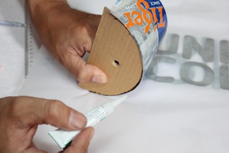 gluing cardboard to can