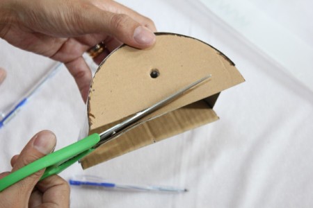 trimming off excess cardboard