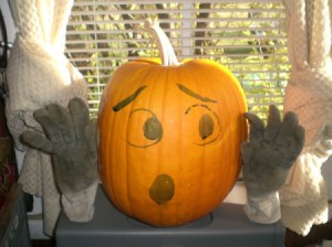 pumpkin with painted on face