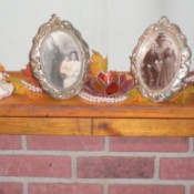 photos and decorations on mantle