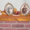 photos and decorations on mantle