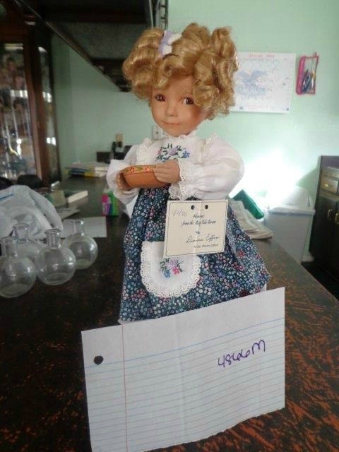 doll with Shirley Temple style curls