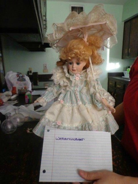 doll with parasol