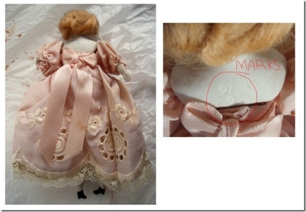 number on back of doll