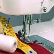 closeup of sewing machine needle area