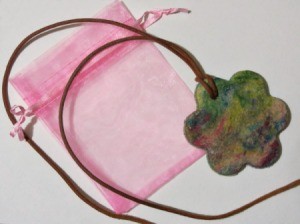 finished pendant on pink gift bag