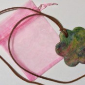 finished pendant on pink gift bag