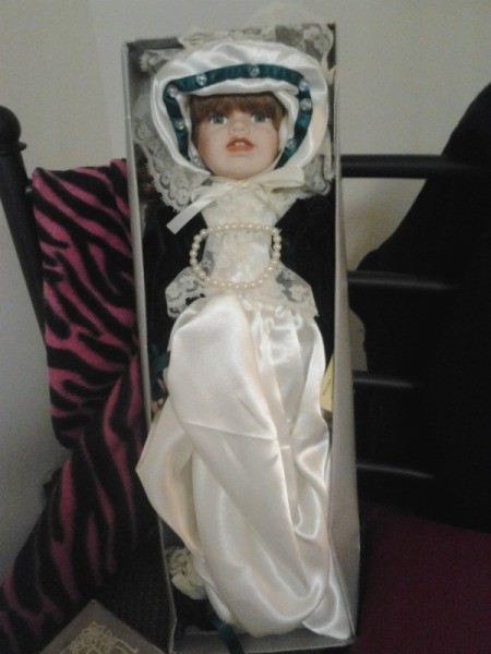 doll in white dress