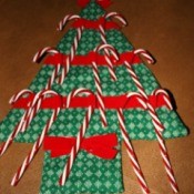tree with candy canes in ribbon slots