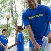 volunteers collecting trash in a park