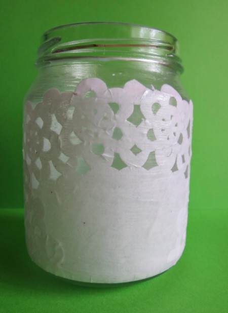 doily paper cut and decoupaged to jar