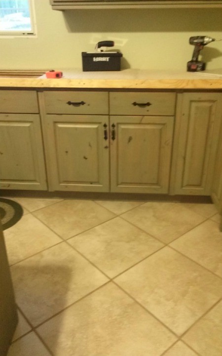 cabinets, wall, and floor tile